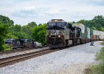 NS 8124 passes a waiting manifest at Wauhatchie Pike